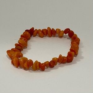 Handmade quality orange quartz chip stones elasticize bracelet. Size 8”. NWOT